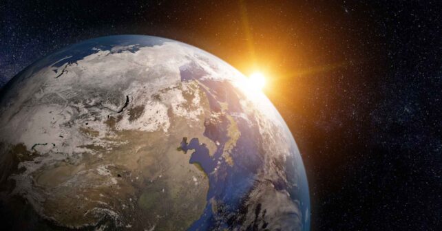 Amanecer sobre la Tierra visto desde el espacio, imagen que ilustra un estudio sobre días de 19 horas